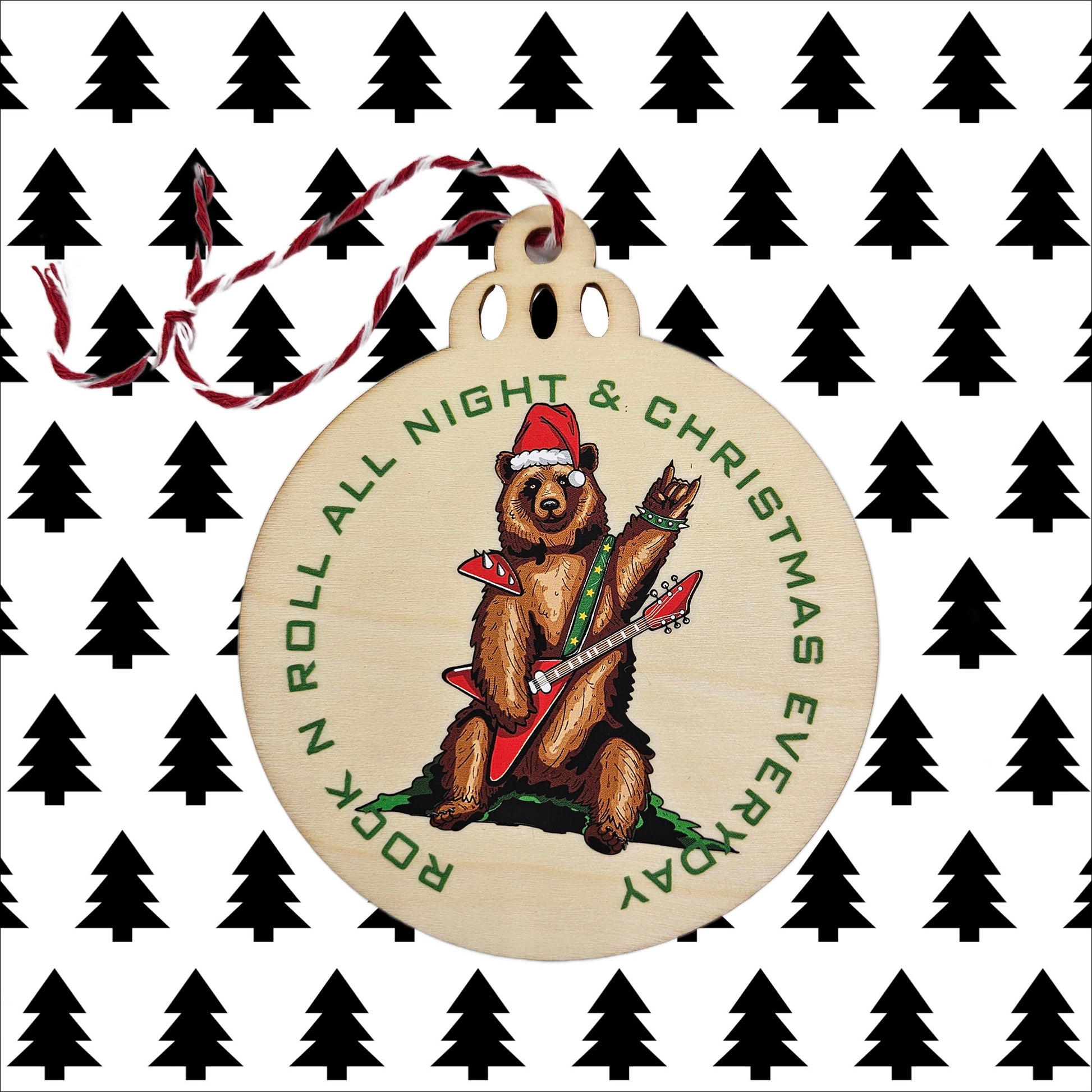 Christmas bear rocking the horn hands on this Christmas ornament.